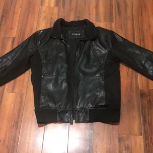 Guess leather jacket worn a lot of time but in mid condition still